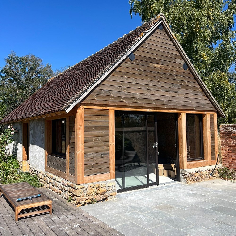 Restauration d'une grange en Poolhouse